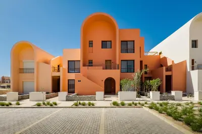 an exterior view of a building at Cool & Curated 1BDR Kamaran El Gouna in Hurghada