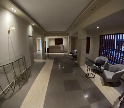 a lobby with chairs and a living room at Alhambara compound in Hurghada