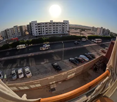 a view of a parking lot with cars parked at Alhambara compound in Hurghada