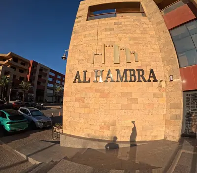 a building with a sign that reads alhambra at Alhambara compound in Hurghada