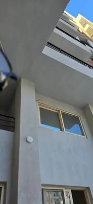 a building with windows on the side of it at Tiba Golden Blue Mirage Hurghada in Hurghada