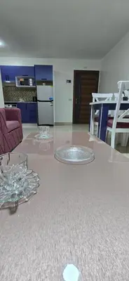 a living room with a couch and a table at Tiba Golden Beach View Hurghada in Hurghada