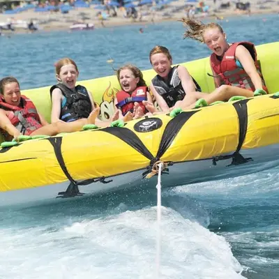 a group of girls sitting on a raft in the water at Turista Tour in Hurghada