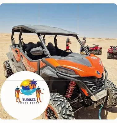 an orange atv parked in the desert at Turista Tour in Hurghada