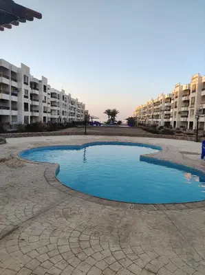 a small pool of water in the middle of a building at Summer land in Hurghada