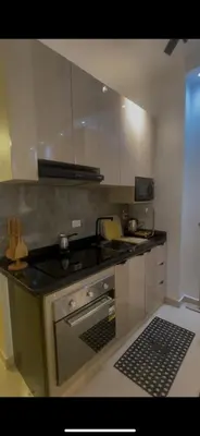 a kitchen with a stove and a counter top at apartment for rent in hurghada in Hurghada