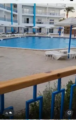 a view of the pool at the beach hotel or nearby at شالية فى قرية ميراج باى الغردقة in Hurghada