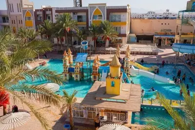 a pool at a resort with a water park at شالية فى قرية ميراج باى الغردقة in Hurghada