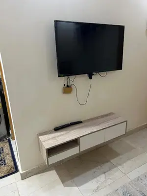 a flat screen tv hanging on a wall at شالية فى قرية ميراج باى الغردقة in Hurghada
