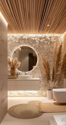 a bathroom with a stone wall and a mirror at Grand Nile Cruises - Luxor to Aswan 4 Nights - Aswan to Luxor 3 Nights - Include sightseeing in Luxor