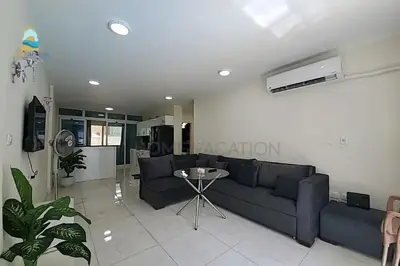 a living room with a couch and a table at luxury apartment in Hurghada