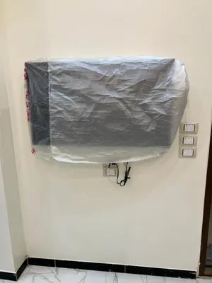a plastic bag is hanging on a wall at شقة خلف فندق الإليزي in Hurghada