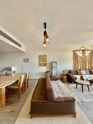 a living room with a couch and a table at Villa with pool Miska Soma Bay in Hurghada