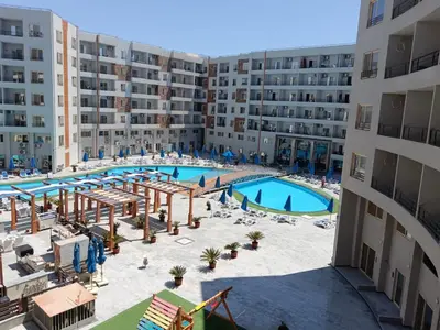 an aerial view of a swimming pool in a apartment complex at استوديو في ذهبية طيبة جولدن الغردقة in Hurghada