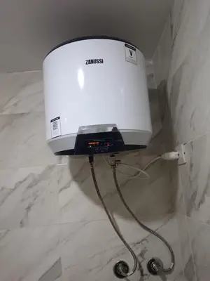 a white appliance sitting on a marble counter top at استوديو في ذهبية طيبة جولدن الغردقة in Hurghada