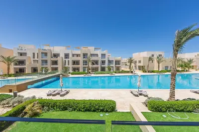 an image of a swimming pool at a resort at Special apartment with Pool and Seasideview, El Gouna in Hurghada