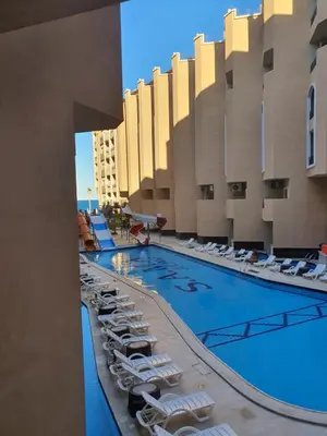 a view of the pool at the resort at جوليانا بيتش ريزورت in Hurghada