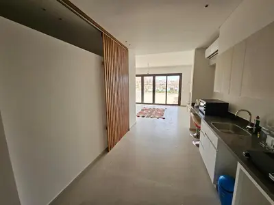 a kitchen with a sink and a counter top at Cozy 1BR Retreat in Gouna in Hurghada