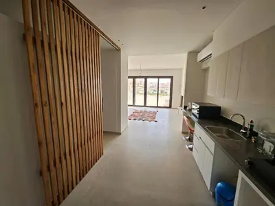 a kitchen with a sink and a counter top at Cozy 1BR Retreat in Gouna in Hurghada