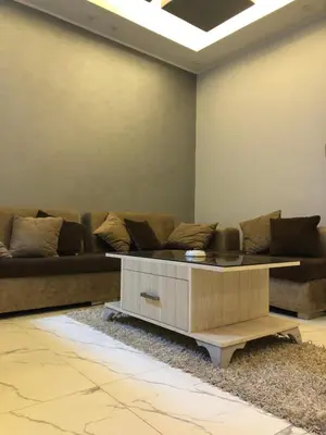 a living room with a couch and a coffee table at sheraton street in Hurghada