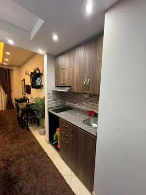 a kitchen with a sink and a counter top at كمباوند فلورينزا خمسين وسط الغردقه in Hurghada
