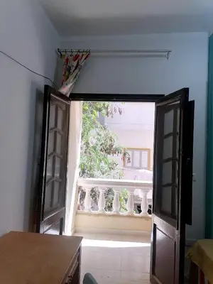 an open door to a room with a window at room2 a room in Hostel of 4 rooms in Hurghada
