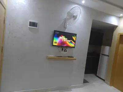 a tv on a wall in a room at ميراج باي ريزورت منتجع لافستا in Hurghada