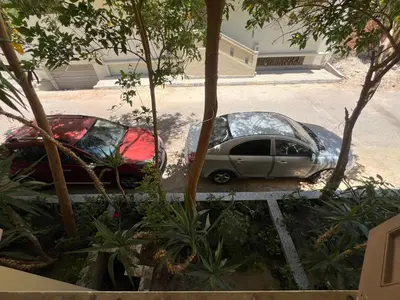 a car that has been parked in a driveway at 3 bedroom duplex in Hurghada
