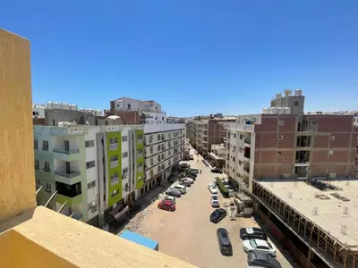 an aerial view of a city street with buildings at Bayt Hassan A12 - 2 bedrooms European new apartment in Hurghada