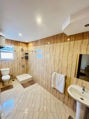 a bathroom with a toilet and a sink at touristic centre Andalusia in Hurghada