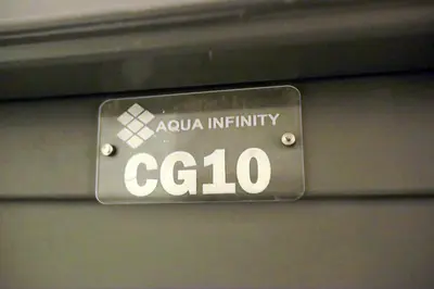 a sign that says acula infinity egoo on a wall at One bedroom apartment with living room in Aqua Infinity before El Gouna in Hurghada