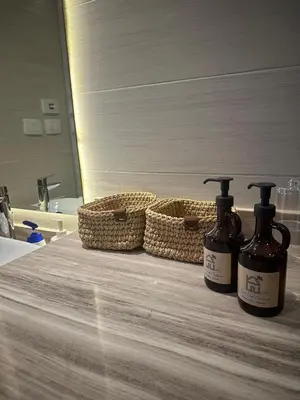 two bottles of soap sitting on a counter in a bathroom at G cribs cozy 1bd apartment in El Gouna