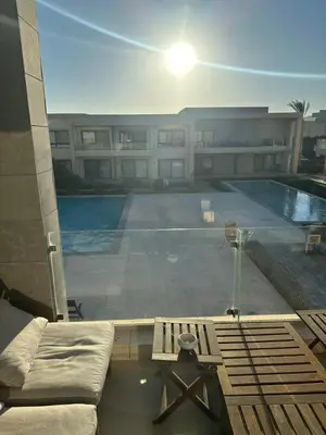 a large swimming pool in front of a building at Elgouna g-cripes b-7 in Hurghada