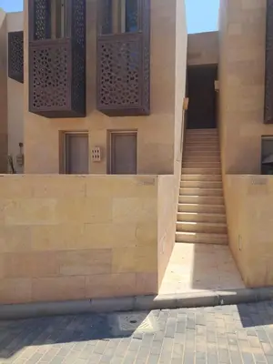 a building with a staircase and a stair case at elgouna scarab es first floor in El Gouna
