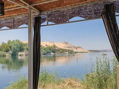 a view of a river from a window at Villa Swenet in Aswan