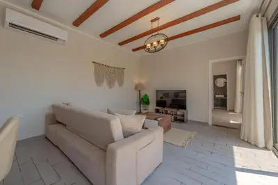 a living room with a couch and a table at Luxury Stays in Bali El Gouna in Hurghada