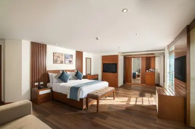 a hotel room with a bed and a couch at 4 nighhts luxury Nile cruise from Luxor to Aswan in Qena