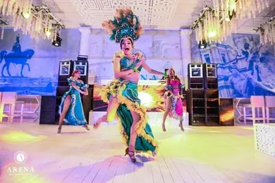 a group of women dancing on a dance floor at SELENA BAY Luxury Suite beach front hurghada Arena Bar & restaurant سويت فاخر سيلينا باى in Hurghada