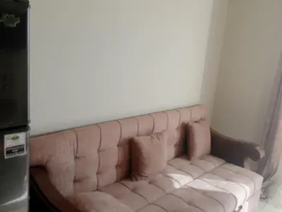 a living room with a couch in a room at Hurghada, El-Marina in Hurghada