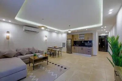 a living room with a couch and a table at Selena Bay in Hurghada