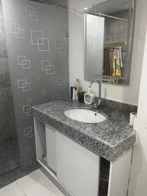 a bathroom with a sink and a mirror at Scandic resort chalet sea view in Hurghada