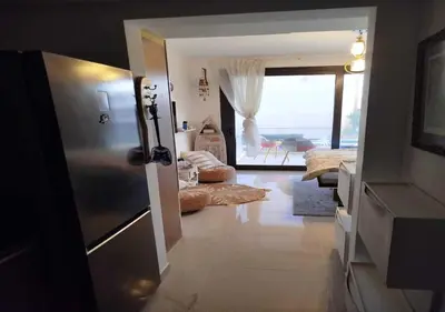 a hallway with a door to a room with a view at Studio at G Cribs B21-F10 El Gouna in Hurghada