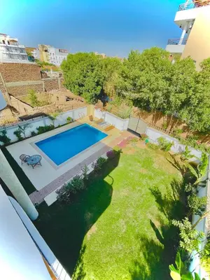 an aerial view of a yard with a swimming pool at Luxor in Al Karnak