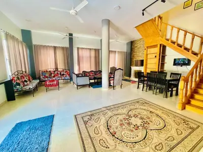a living room with a rug on the floor at Luxor in Al Karnak