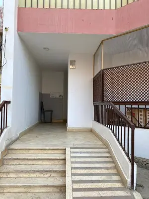 a set of stairs leading up to a building at Desert Pearl luxury apartment in Hurghada