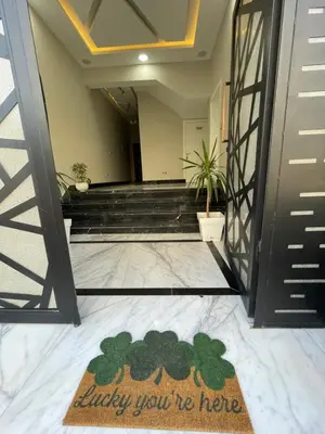 a welcome mat in theoyer of a building with the words hurry youre home at Endless Summer Apartment House W7 in Safaga