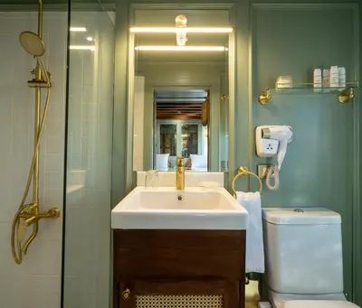 a bathroom with a sink and a toilet at HMC Zahra Dahabyia in Luxor