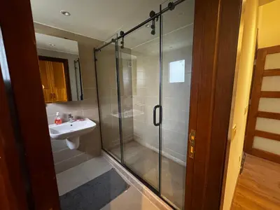 a bathroom with a shower and a sink at Private Somabay Villa with Pool in Hurghada