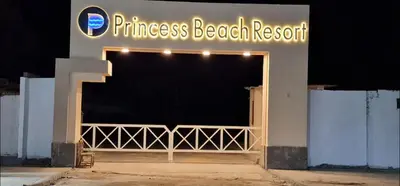 a entrance to a fitness beach resort at night at Hurgada Princess resort on Mamsha with private beach&pools in Hurghada