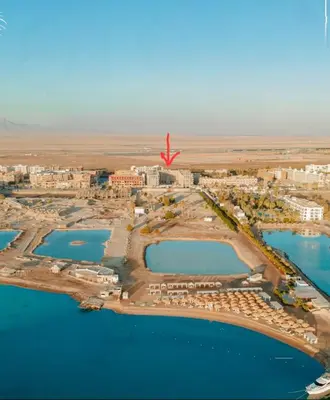 an aerial view of a city with water and buildings at Hurgada Princess resort on Mamsha with private beach&pools in Hurghada